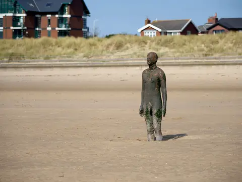 Photo of Another Place, Crosby, a landmark near Liverpool, Merseyside, north west England.