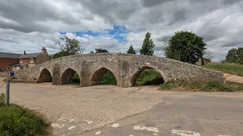 Photo of Moulton Packhorse Bridge, a landmark near Burwell, Suffolk, eastern England.