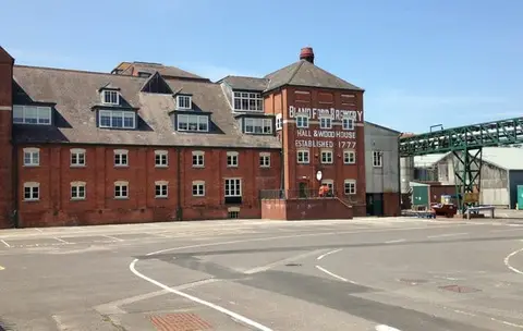 Photo of Hall & Woodhouse (Badger) Brewery, a brewery near Blandford St Mary, Dorset, south west England.