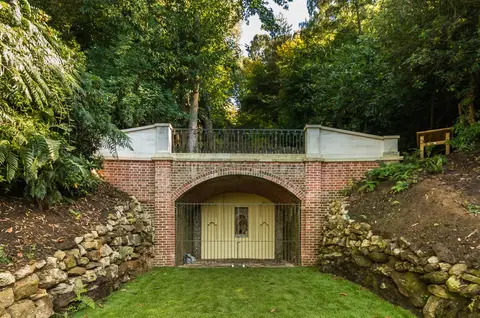 Photo of The Deepdene Trail, a Grade II* registered house & garden near Dorking, Surrey, south east England.