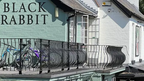 Photo of The Black Rabbit, a pub near Offham in the South Downs, West Sussex, south east England.