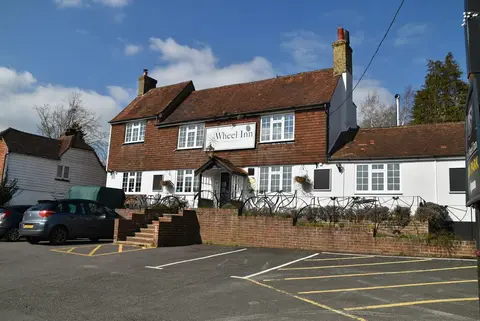 Photo of The Wheel Inn, a pub near Burwash Weald in the High Weald, East Sussex, south east England.
