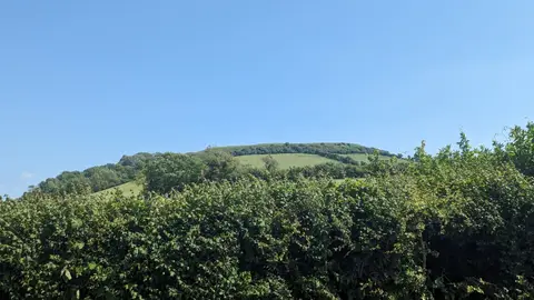 Photo of Brent Knoll hillfort, a hillfort near Axbridge, Somerset, south west England.