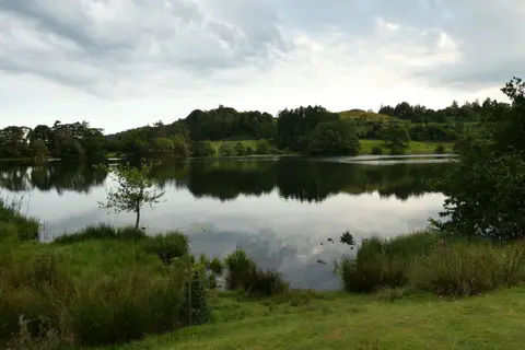 Photo of Loughrigg Tarn, a tarn near Elterwater in the Lake District, Cumbria, north west England.