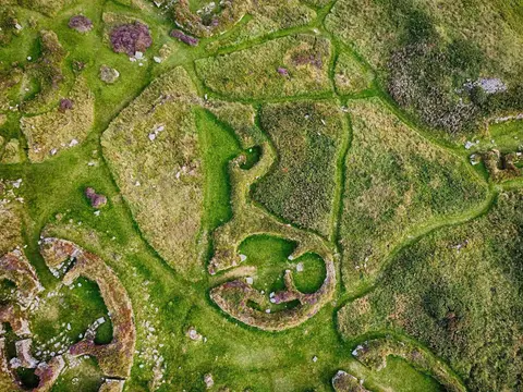 Photo of Chysauster Ancient Village, a prehistoric village near Zennor, Cornwall, south west England.