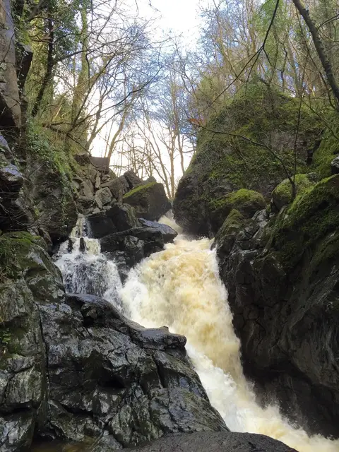 Photo of Sgwd Sychryd (Sychryd Cascades), a waterfall near Pontneddfechan, Rhondda Cynon Taf, south east Wales.