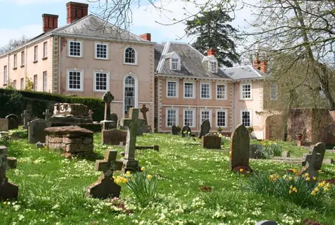Photo of Nynehead Court, a Grade II* registered house & garden near Crowcombe, Somerset, south west England.