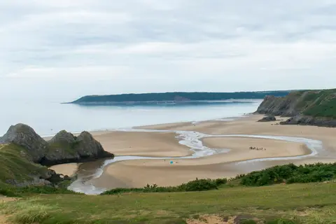 Photo of Three Cliffs Bay, a beach near Penmaen in Gower, Swansea, south west Wales.