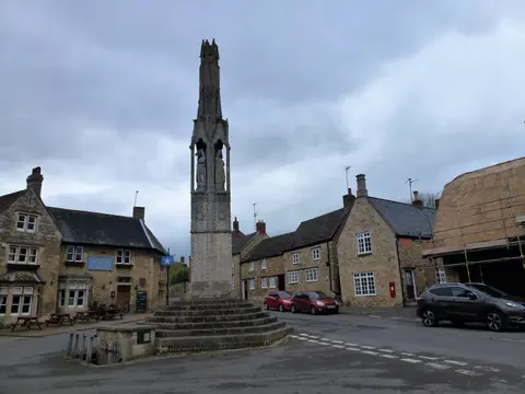 Photo of Eleanor Cross, Geddington, a landmark near Brigstock, Northamptonshire, central England.