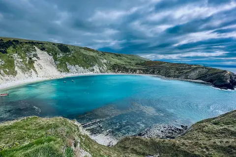 Photo of Lulworth Cove, a swimming spot near Osmington, Dorset, south west England.