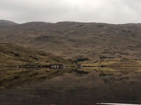 Photo of Loch Assynt, a loch near Unapool in Assynt–Coigach, Highland, the Scottish Highlands and Islands.