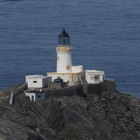 Photo of Muckle Flugga Lighthouse, a lighthouse near Haroldswick in Shetland, the Shetland Islands, the Scottish Highlands and Islands.
