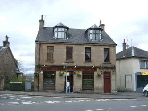 Photo of Woodside Inn, a pub in Falkirk, central Scotland.