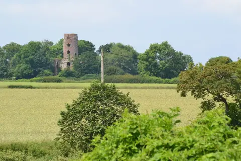 Photo of Racton Monument, a folly near Chidham in the South Downs, West Sussex, south east England.