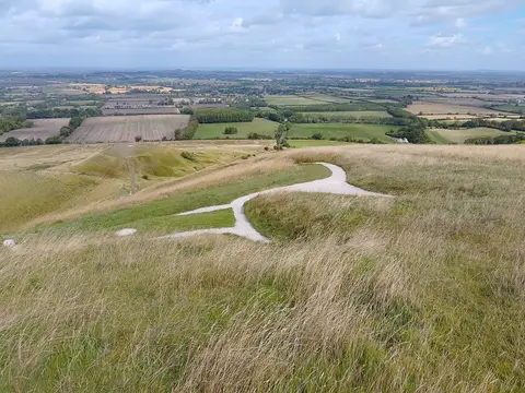 Photo of Uffington White Horse, a hill figure in the North Wessex Downs, Oxfordshire, south east England.