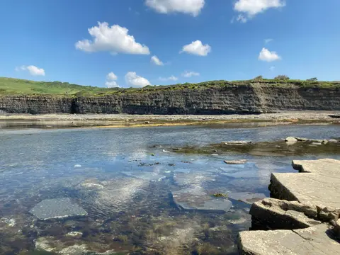 Photo of Kimmeridge Bay, a swimming spot near Kingston, Dorset, south west England.