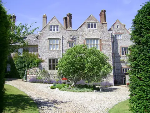 Photo of Glynde Place, a Grade II* registered house & garden in the South Downs, East Sussex, south east England.